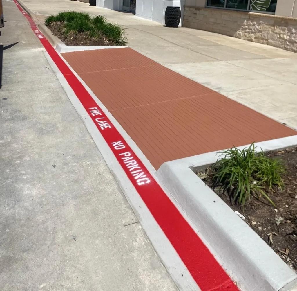 Commercial fire lane curb and decorative concrete flatwork