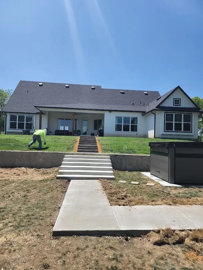 Concrete steps and walkway at new construction home